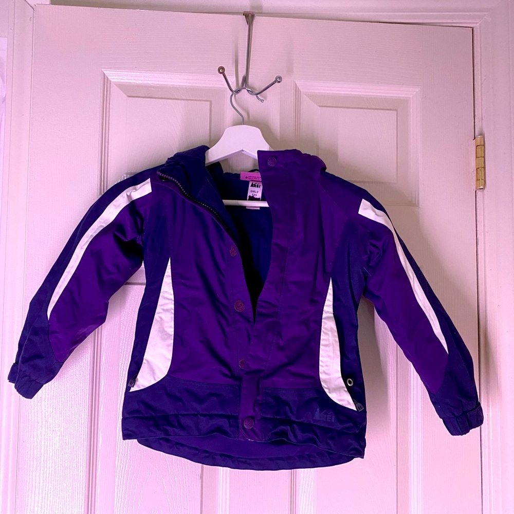 REI girl jacket purple and white.